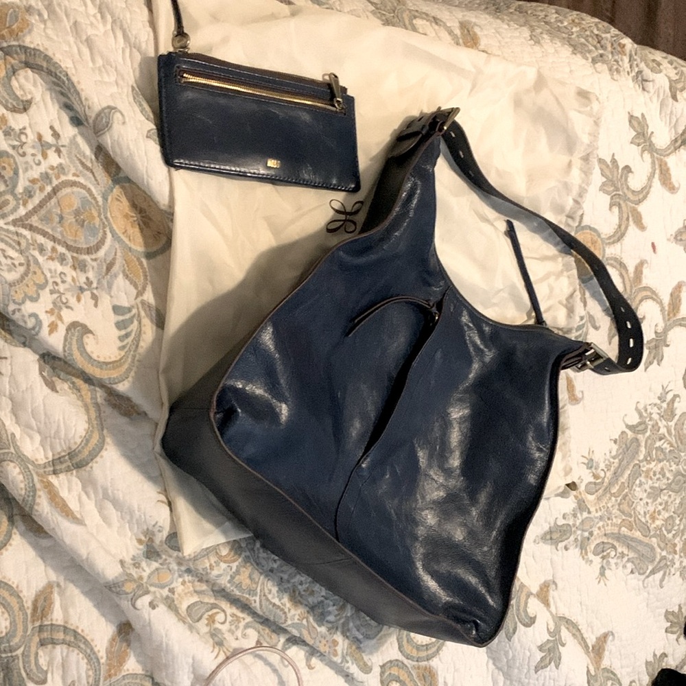 Excellent used condition blue Hobo shoulder bag with matching wallet